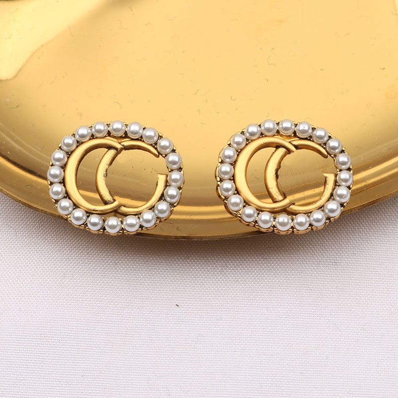 Womens 18K Gold Plated Dangle Earrings Stud Brand Designers Diamond Letter Luxury Women Earring Wedding Party Jewerlry Classic Style 8278
Womens 18K Gold Plated Dangle Earrings Stud Brand Designers Diamond Letter Luxury Women Earring Wedding Party Jewerlry Classic Style 8278