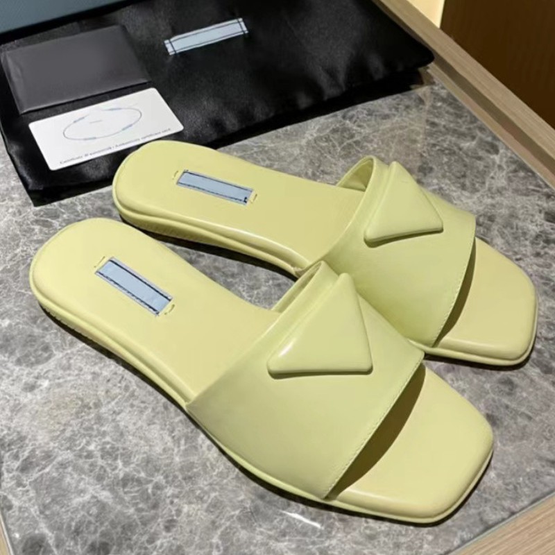 Fashion Solid Color Lady Slippers Luxury Leisure Leather Flat Bottom Sandals Summer Mule LOGO Slides Designer Triangle Buckle Womens Classic Beach Shoes Flip Flops, Prda3225
Fashion Solid Color Lady Slippers Luxury Leisure Leather Flat Bottom Sandals Summer Mule LOGO Slides Designer Triangle Buckle Womens Classic Beach Shoes Flip Flops, Prda3225