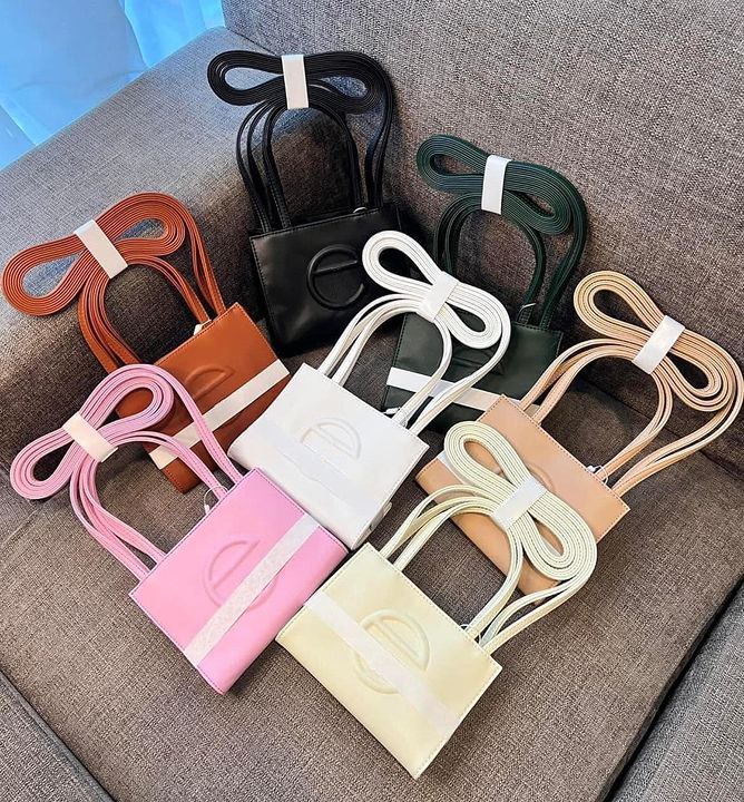Telf ars fashion shopping beach duffle bags travel Luxurys Designers womens mens man Genuine leather Shoulder Totes Clutch Cross Body handbags pink large hand bag, Pearl chocolate
Telf ars fashion shopping beach duffle bags travel Luxurys Designers womens mens man Genuine leather Shoulder Totes Clutch Cross Body handbags pink large hand bag, Pearl chocolate