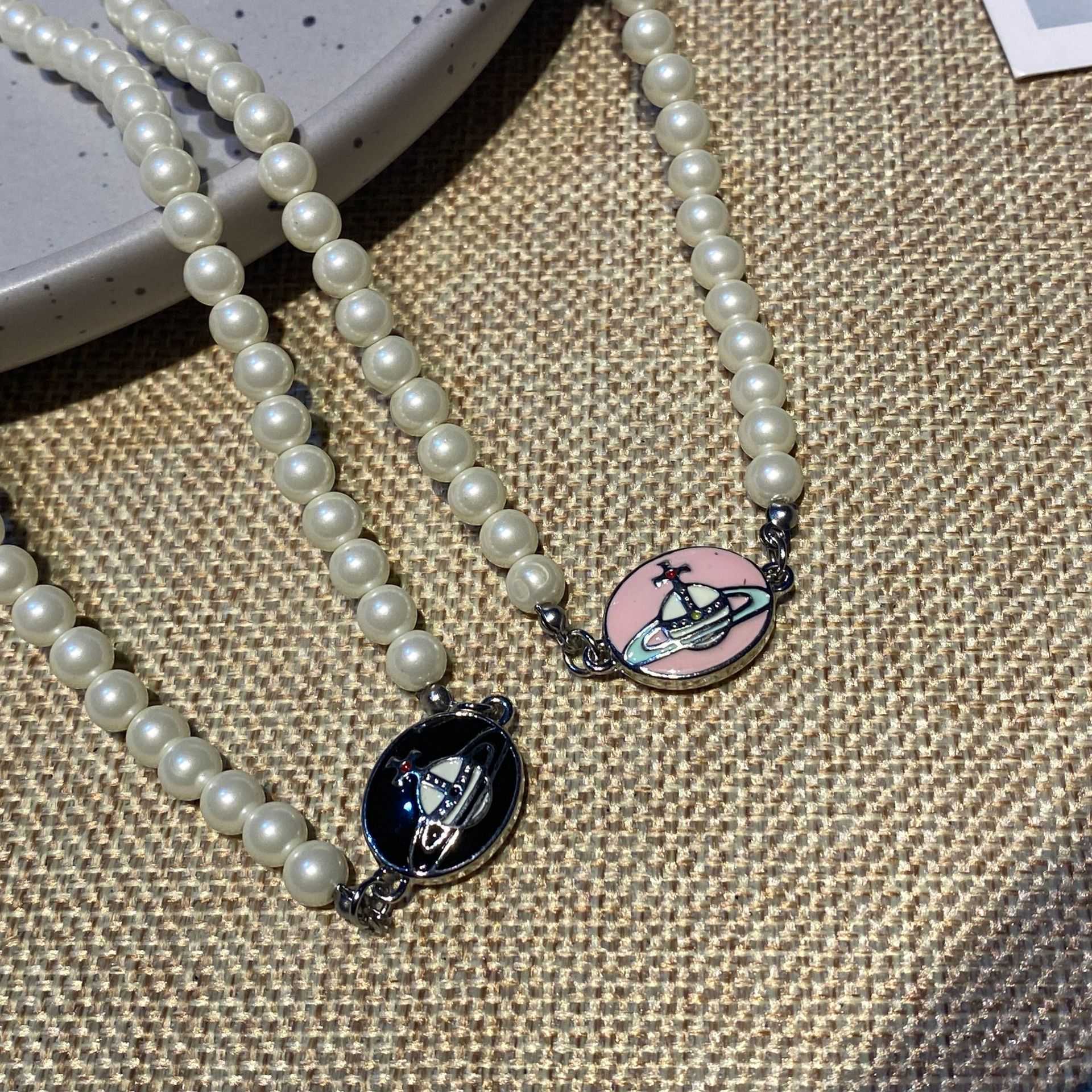 Lisa's same Vivian ansey empress dowager enamel Saturn pearl necklace small light luxury clavicle chain planet Earrings tide
Lisa's same Vivian ansey empress dowager enamel Saturn pearl necklace small light luxury clavicle chain planet Earrings tide