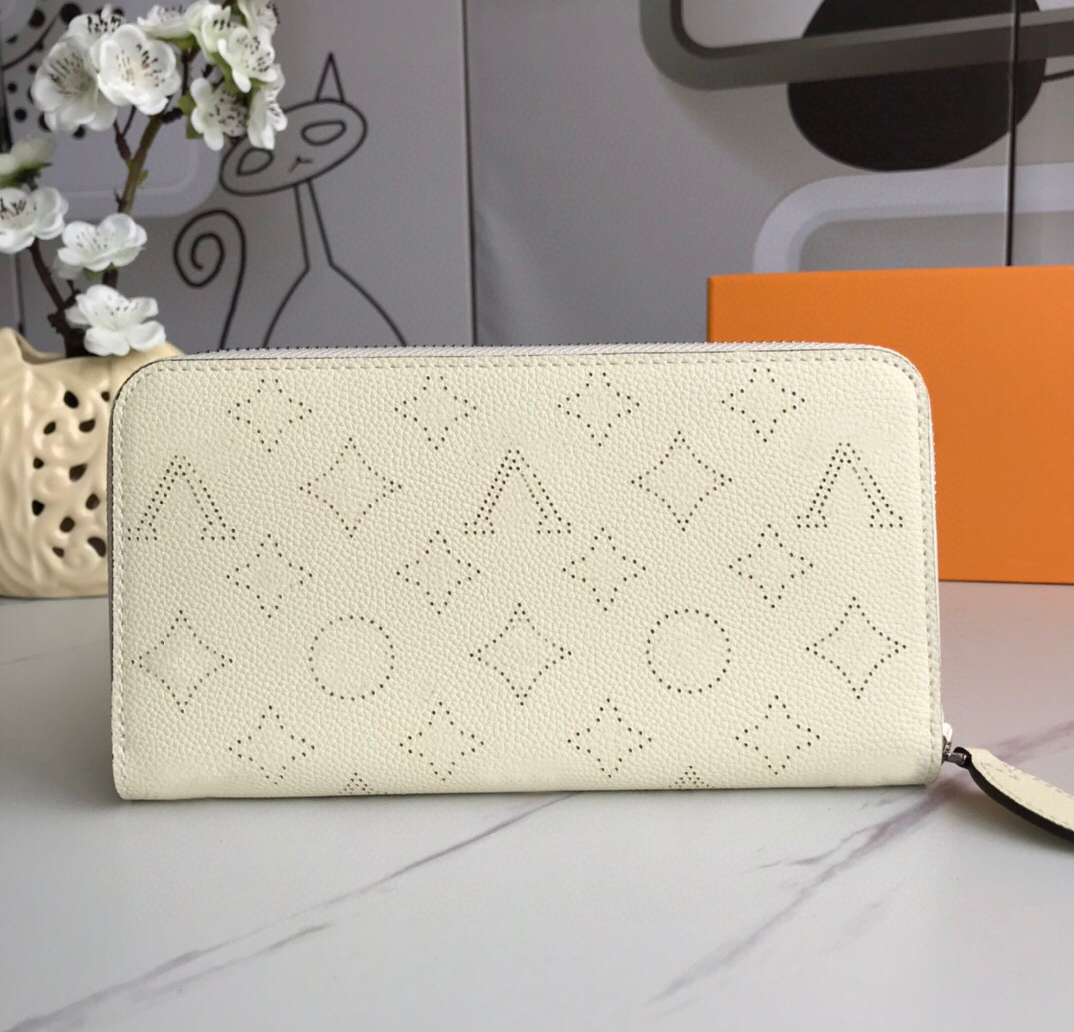 Fashion designer wallets luxury zipper purses mens womens wallet high-quality perforated flower letter long card holders slim money clutch bags with box wholesale, 61867#monogrames-perforated
Fashion designer wallets luxury zipper purses mens womens wallet high-quality perforated flower letter long card holders slim money clutch bags with box wholesale, 61867#monogrames-perforated