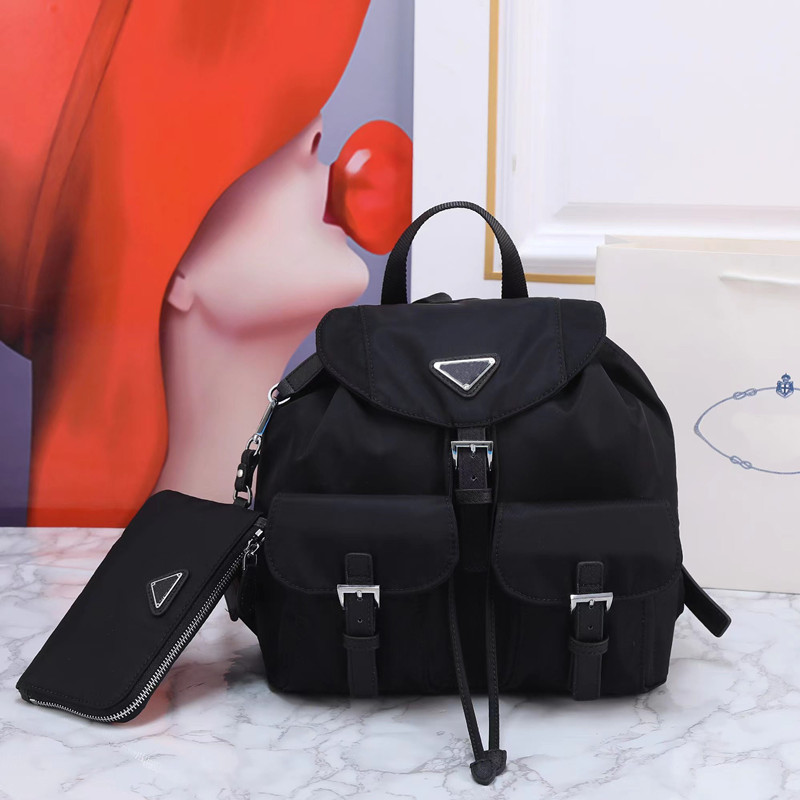Fashion women black Re-Nylon backpack with Zip regenerated nylon detachable pouch 
Fashion women black Re-Nylon backpack with Zip regenerated nylon detachable pouch