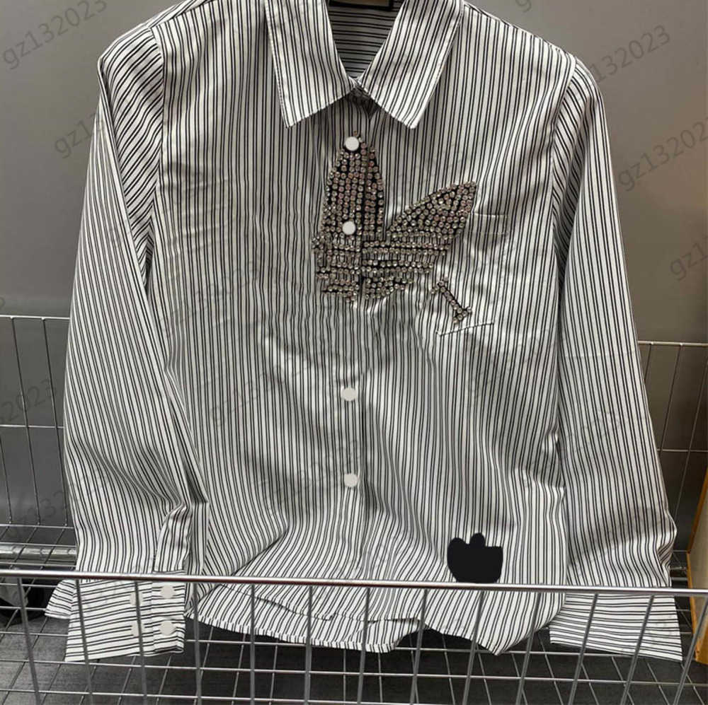 Womens Blouses Hot Drill Letter Logo Lapel Long Sleeves Shirts Vertical Print Button Open Irregular Hem Design Slimming Blouses Shirts For Women Graphic 1970, 12
Womens Blouses Hot Drill Letter Logo Lapel Long Sleeves Shirts Vertical Print Button Open Irregular Hem Design Slimming Blouses Shirts For Women Graphic 1970, 12