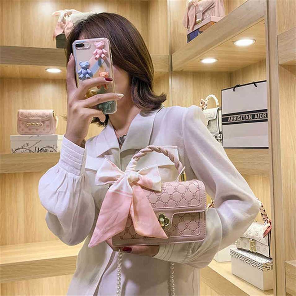2023 Designer bag handbag style pearl chain Bag embossed portable shoulder bow scarf small square bag, White6
2023 Designer bag handbag style pearl chain Bag embossed portable shoulder bow scarf small square bag, White6