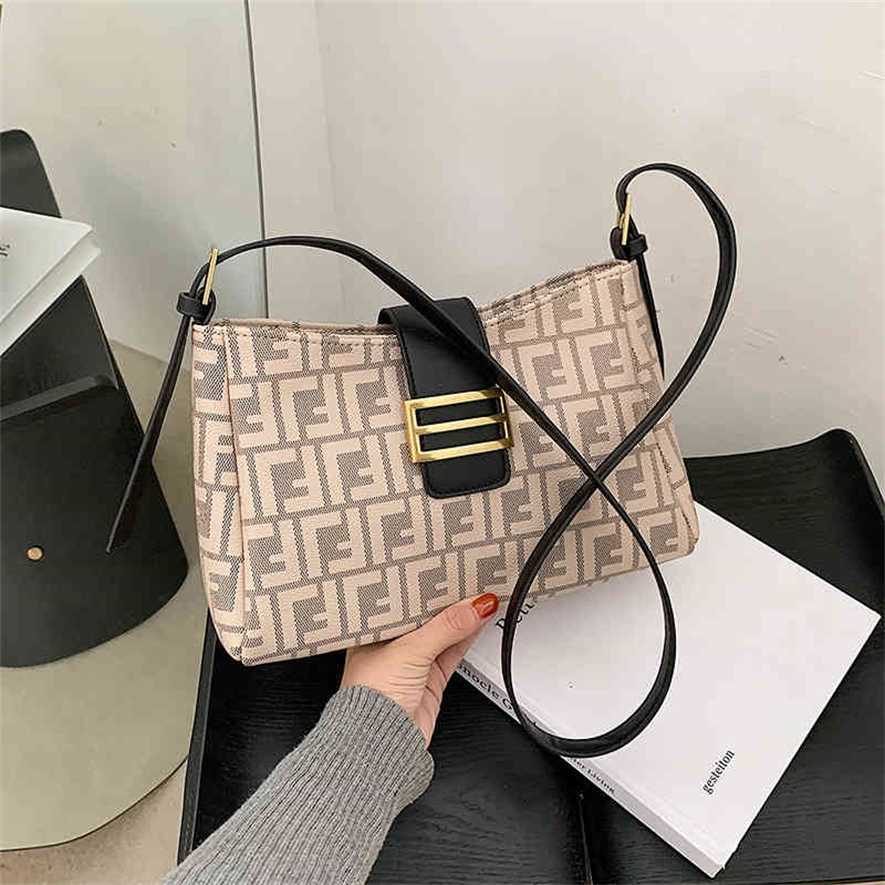 2023 Designer bag Temperament women's shoulder bag new leather letter crescent bag versatile trend armpit bag, Beige
2023 Designer bag Temperament women's shoulder bag new leather letter crescent bag versatile trend armpit bag, Beige