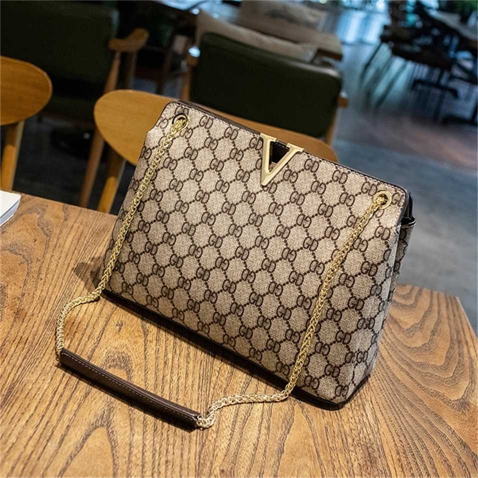 2023 Designer bag Handbag Women's Korean high-capacity Tote printed single Messenger portable chain, Khaki gd
2023 Designer bag Handbag Women's Korean high-capacity Tote printed single Messenger portable chain, Khaki gd