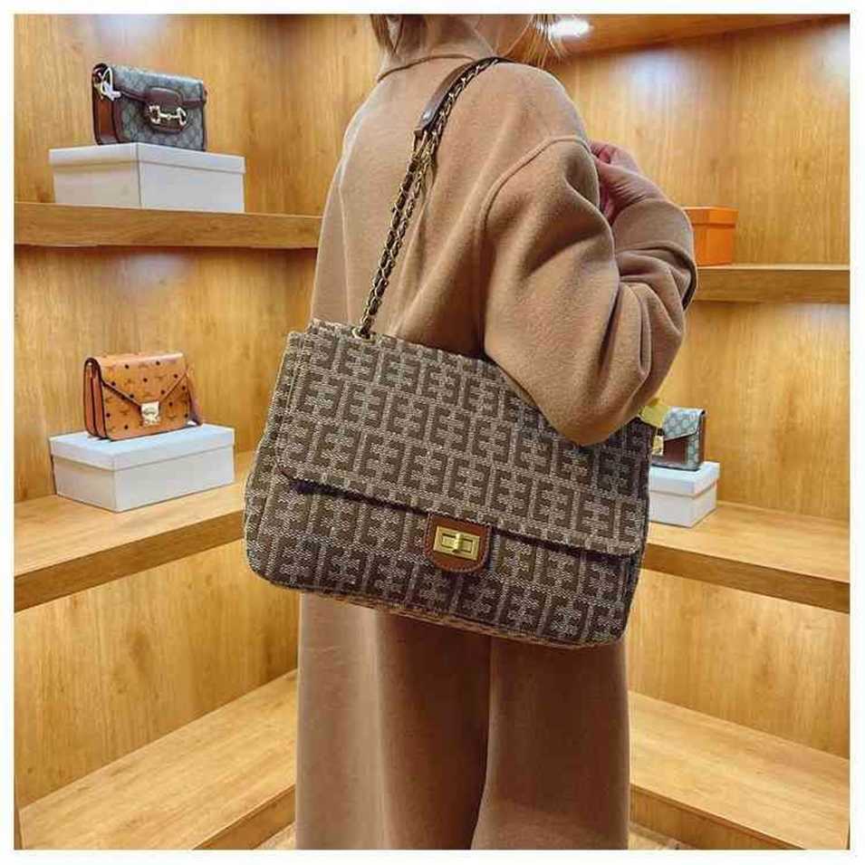 2023 Designer bag Handbag 5UJA large capacity single armpit winter canvas printed messenger women's light and, Dark brown
2023 Designer bag Handbag 5UJA large capacity single armpit winter canvas printed messenger women's light and, Dark brown