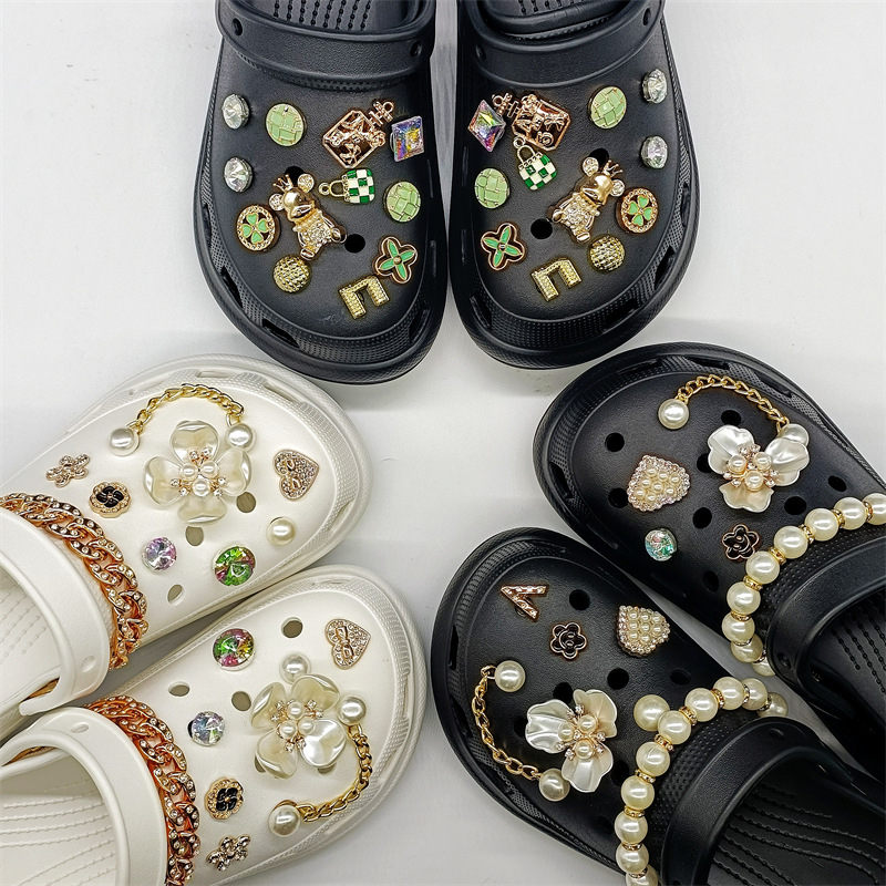 Wholesale Bling Shoe Decoration Charm Rhinestone Pearl Chains Set Jibbitz for Croc Charms Clog Pins Charm Pack
Wholesale Bling Shoe Decoration Charm Rhinestone Pearl Chains Set Jibbitz for Croc Charms Clog Pins Charm Pack