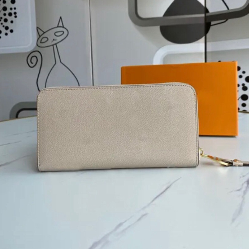 Trendy Embossed Leather Wallet for Women's Small Leather Goods Genuine Leather Zippy Wallets sold with box, Beige zippy wallet
Trendy Embossed Leather Wallet for Women's Small Leather Goods Genuine Leather Zippy Wallets sold with box, Beige zippy wallet