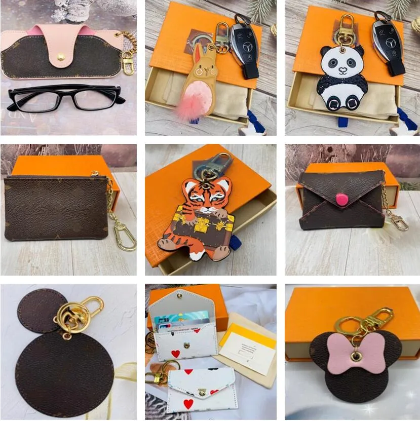 Designers Mini Wallet Fashion Womens Mens Keychain Ring Credit Card Holder Coin Purse Luxury Original Box Wallets Purse Crossbody Bag
Designers Mini Wallet Fashion Womens Mens Keychain Ring Credit Card Holder Coin Purse Luxury Original Box Wallets Purse Crossbody Bag