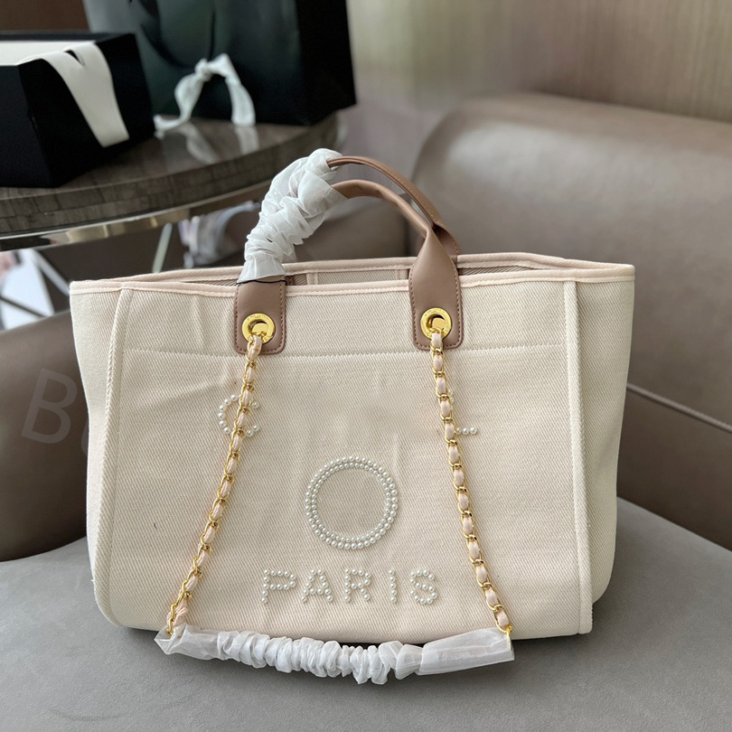 Designer bag Deauville Totes Canvas Pearl Medium Handbags Women White black Summer Beach bag large capacity shopping tote, Green deauville totes
Designer bag Deauville Totes Canvas Pearl Medium Handbags Women White black Summer Beach bag large capacity shopping tote, Green deauville totes