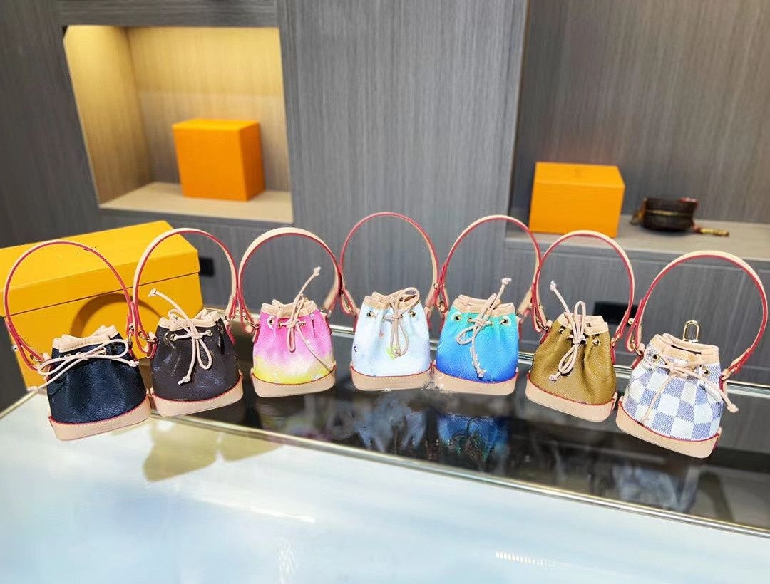 Newest Classic Unisex Coin Purses with Keychain Mini Handbag Clutch Bags Brand Colorful Gradient Letter Plaid Printing Small Bucket Bag Wallet Bags Pendant Charms, Yellow
Newest Classic Unisex Coin Purses with Keychain Mini Handbag Clutch Bags Brand Colorful Gradient Letter Plaid Printing Small Bucket Bag Wallet Bags Pendant Charms, Yellow