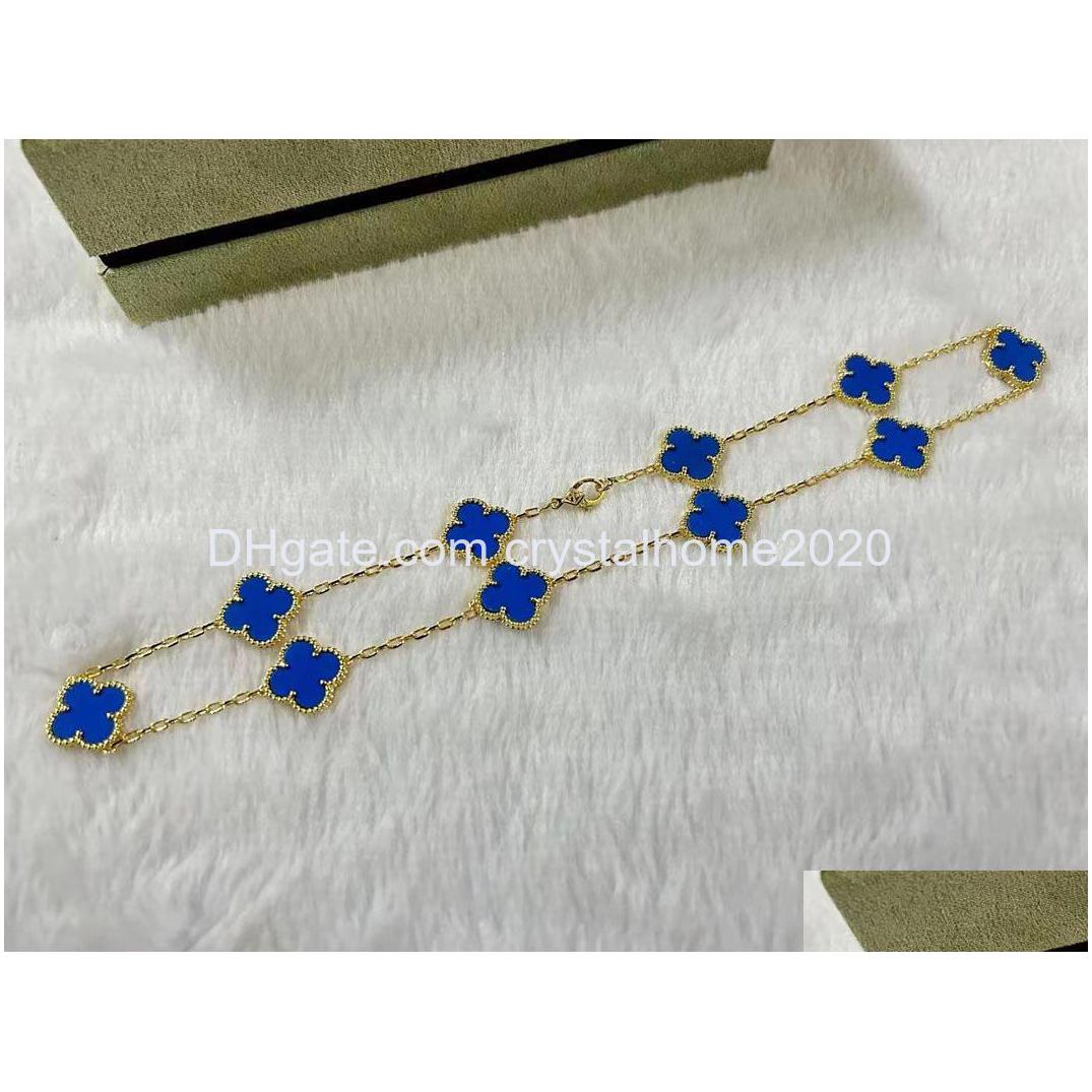 Pendant Necklaces Luxury Van Brand Clover Designer 18K Gold Cross Chain Blue Stone 15Mm 4 Leaf 10 Flower Choker Necklace Nice Party Ot7Ik
Pendant Necklaces Luxury Van Brand Clover Designer 18K Gold Cross Chain Blue Stone 15Mm 4 Leaf 10 Flower Choker Necklace Nice Party Ot7Ik