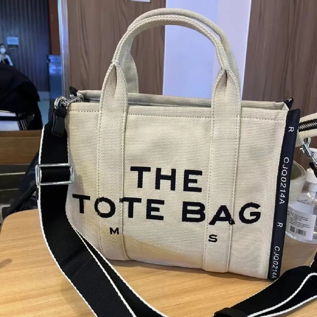 High quality Marc the tote Bag luxury handbag Womens Mens Designer marc jocobs bag cowboy pochette Shoulder bag Crossbody marcjocobs Canvas nylon travel clutch bags, White
High quality Marc the tote Bag luxury handbag Womens Mens Designer marc jocobs bag cowboy pochette Shoulder bag Crossbody marcjocobs Canvas nylon travel clutch bags, White
