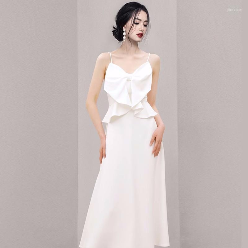 Casual Dresses Runway Summer White Big Bow Midi Dress 2023 Chic Fashion Women Spaghetti Strap Sexy V Neck Ruffles Slim Waist Long Vestidos
Casual Dresses Runway Summer White Big Bow Midi Dress 2023 Chic Fashion Women Spaghetti Strap Sexy V Neck Ruffles Slim Waist Long Vestidos