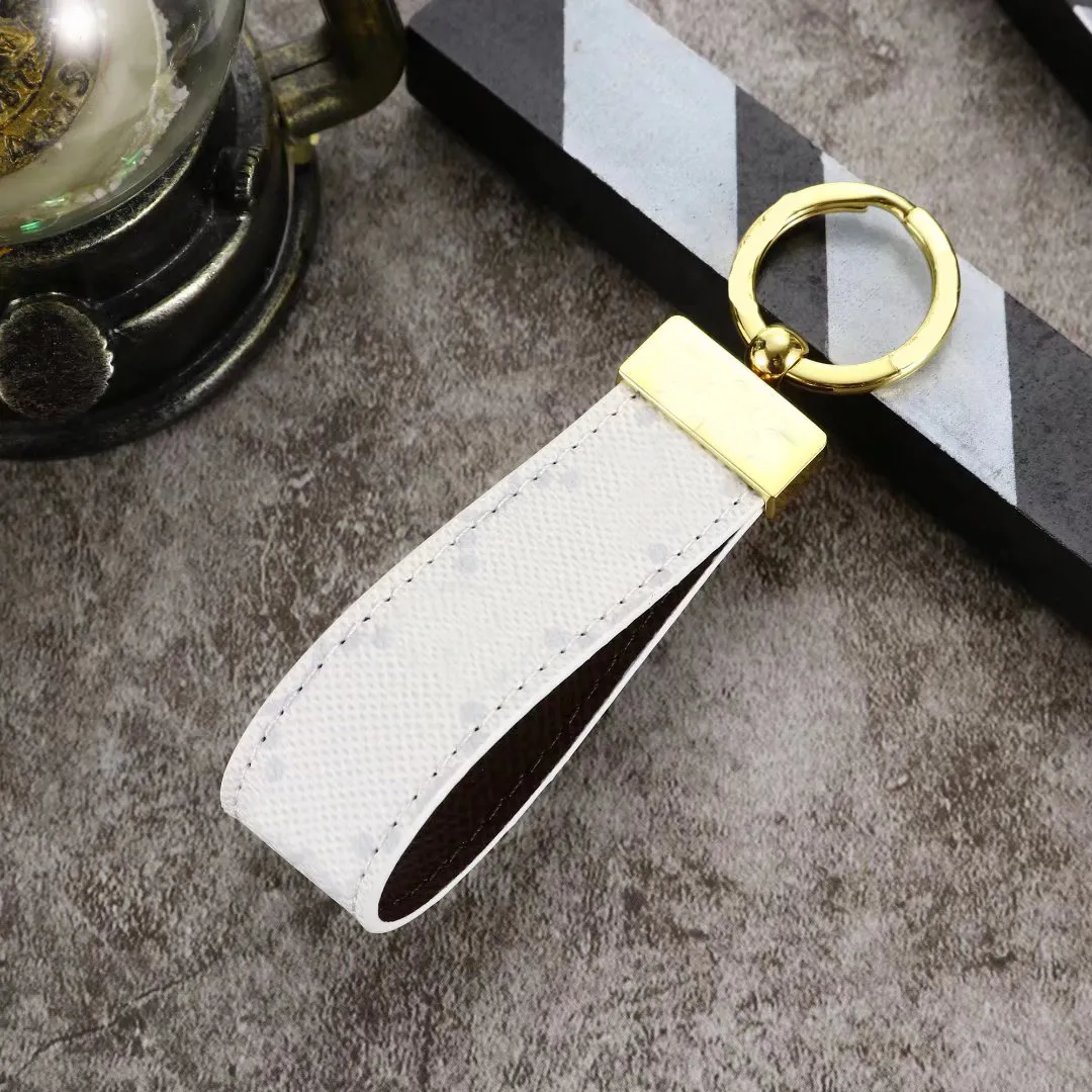 Fashion luxury keychain women men lanyards portable keychains leather car key chain bag charm pendant stainlness unisex keyring classic accessories
Fashion luxury keychain women men lanyards portable keychains leather car key chain bag charm pendant stainlness unisex keyring classic accessories