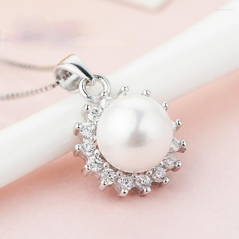 Pendant Necklaces Silver Color Sunflower Pearl Korean Elegant Zircon Necklace Temperament Female Clavicle Chain
Pendant Necklaces Silver Color Sunflower Pearl Korean Elegant Zircon Necklace Temperament Female Clavicle Chain
