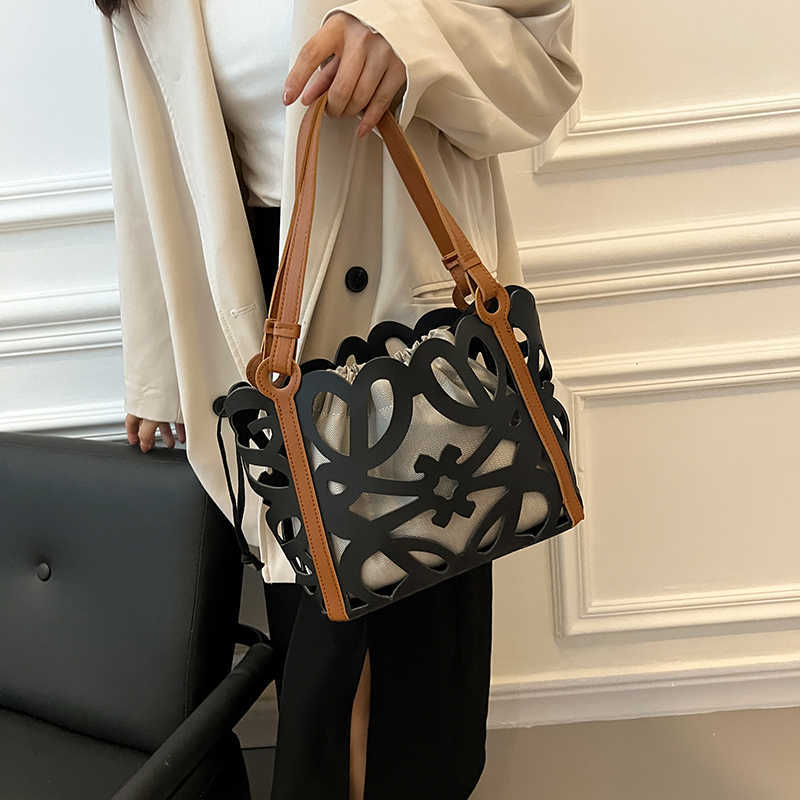 Nxy Hollow Out Pu Leather Shoulder Side Bag for Women Small Tote Bags Y2k Casual Outside Handbags and Purses 230424, Black
Nxy Hollow Out Pu Leather Shoulder Side Bag for Women Small Tote Bags Y2k Casual Outside Handbags and Purses 230424, Black