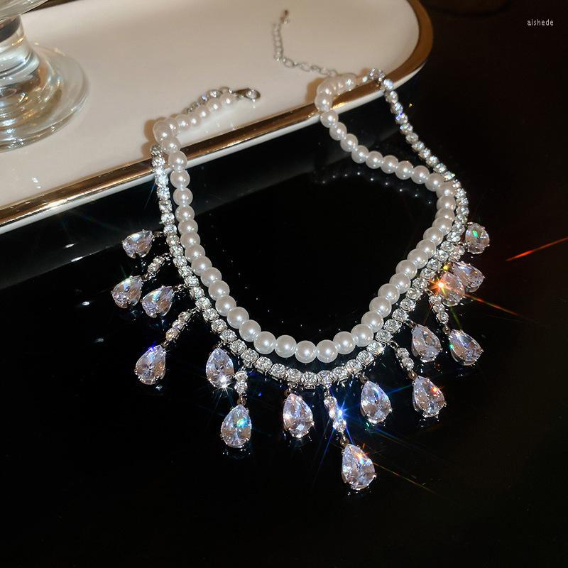 Chains Luxury Pearl Choker Necklaces For Women Tassel Water Drop Zircon Crystal Wedding Banquet Jewelry
Chains Luxury Pearl Choker Necklaces For Women Tassel Water Drop Zircon Crystal Wedding Banquet Jewelry