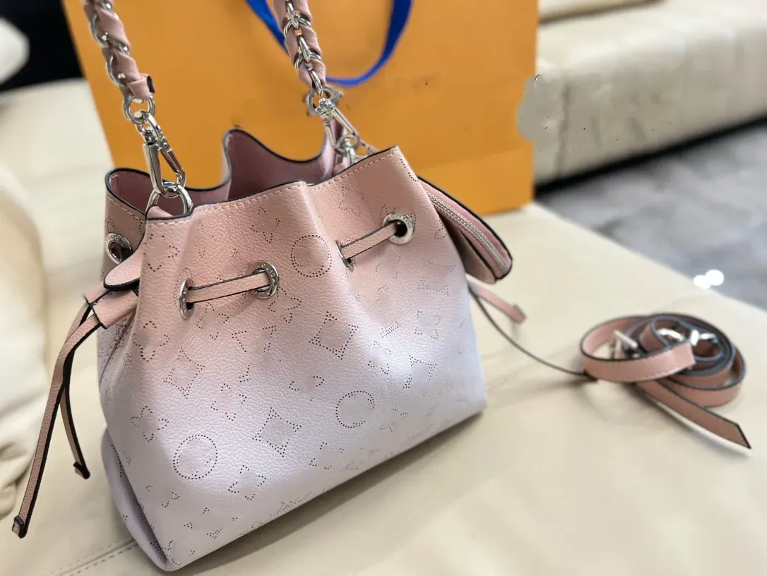 Bella Totes Purse bucket bag Mahina calf leather perforated Monograms pattern Handle Handbag Women Fashion Vintage Crossbody Shoulder Bag Women Shopper Backpack
Bella Totes Purse bucket bag Mahina calf leather perforated Monograms pattern Handle Handbag Women Fashion Vintage Crossbody Shoulder Bag Women Shopper Backpack