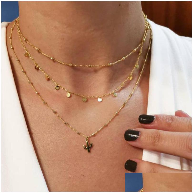 Pendant Necklaces New Vintage Mti Layer Chain Necklace For Women Gold Color Beads Sequins Cactus Choker Drop Delivery Jewelry Pendant Dh2Lk
Pendant Necklaces New Vintage Mti Layer Chain Necklace For Women Gold Color Beads Sequins Cactus Choker Drop Delivery Jewelry Pendant Dh2Lk