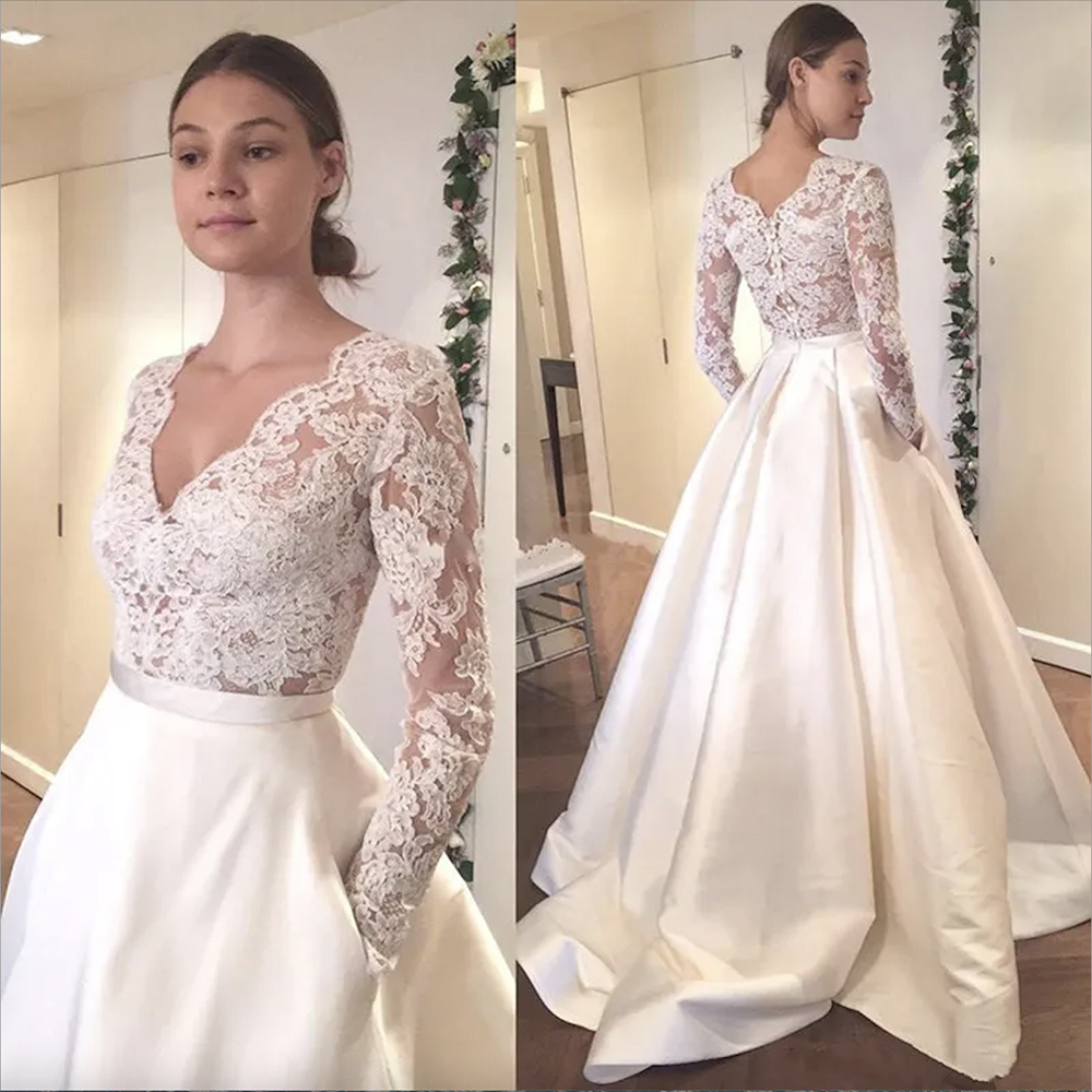 White Appliqued Lace Wedding Dresses Sexy Deep V-neck Illusion Long Sleeves A-line Wedding Gowns Bridal Dress
