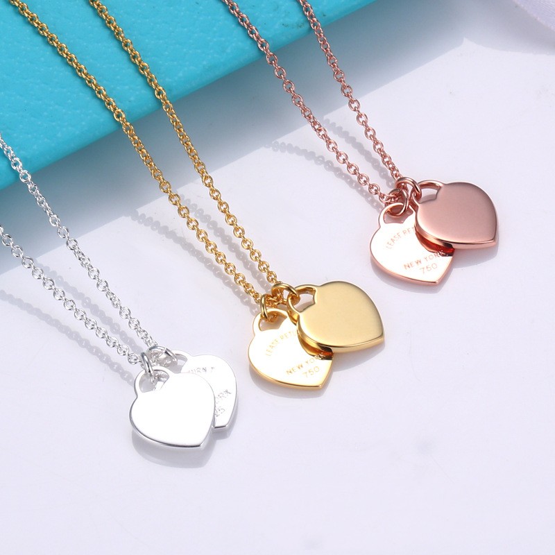 Love Double heart T home necklace Female Seiko high-quality design women's heart-shaped pendant 18K real gold collarbone chain holiday gift
Love Double heart T home necklace Female Seiko high-quality design women's heart-shaped pendant 18K real gold collarbone chain holiday gift