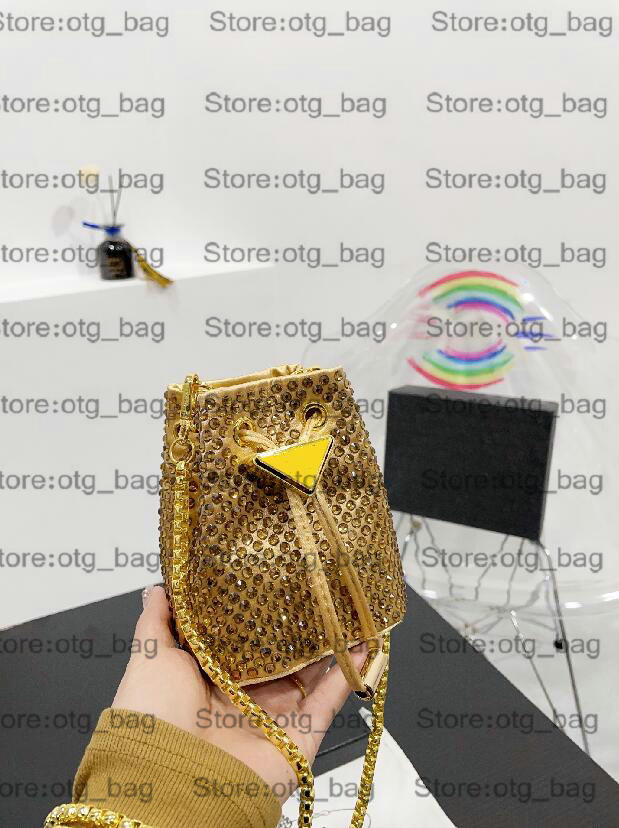Mini Mon Tresor Diamond Bag Bucket Chains Bag All-over Imitation Crystal Shoulder Triangle LOGO Designer Nelon Cross body Womens Luxurys Drawstring Handbag
Mini Mon Tresor Diamond Bag Bucket Chains Bag All-over Imitation Crystal Shoulder Triangle LOGO Designer Nelon Cross body Womens Luxurys Drawstring Handbag