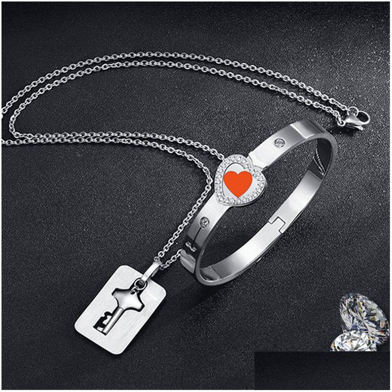 Pendant Necklaces Couple Lovers Jewelry Love Heart Lock Bracelet Stainless Steel Bracelets Bangles Key Necklace Valentines D Dhgarden Dh3We
Pendant Necklaces Couple Lovers Jewelry Love Heart Lock Bracelet Stainless Steel Bracelets Bangles Key Necklace Valentines D Dhgarden Dh3We