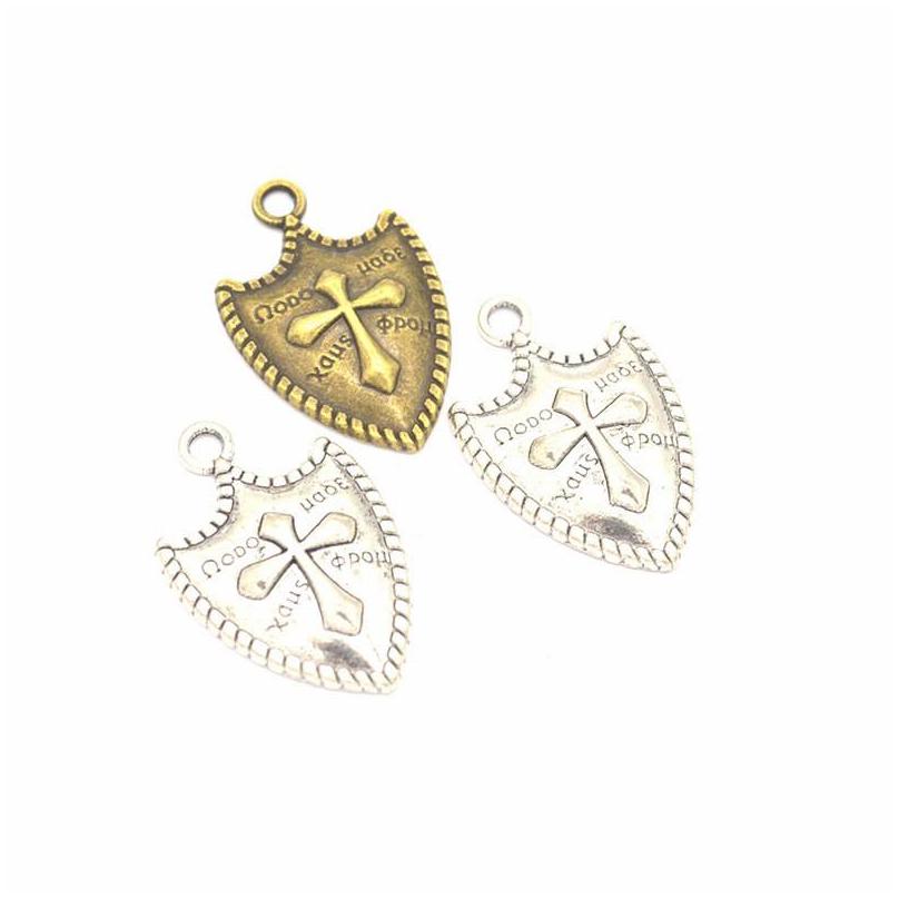 Charms 120Pcs/Lot Cross Shield Pendant Good For Diy Craft Jewelry Making 31X20Mm Antique Sier Bronze Colors Drop Delivery Findings C Dhtna
Charms 120Pcs/Lot Cross Shield Pendant Good For Diy Craft Jewelry Making 31X20Mm Antique Sier Bronze Colors Drop Delivery Findings C Dhtna