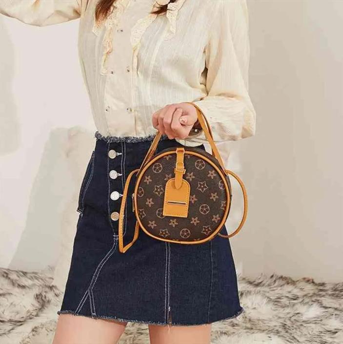 Handbags Mini Purse Tote Bags For Children Fashion Designers Flower One Shoulder Messenger Handbag Round Cake Bag
Handbags Mini Purse Tote Bags For Children Fashion Designers Flower One Shoulder Messenger Handbag Round Cake Bag