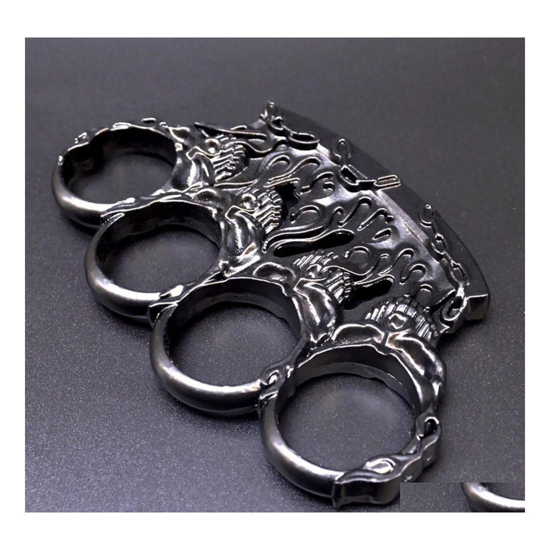 Brass Knuckles Ghost Fire Edc Metal Four Finger Tiger Fist Ring Hand Buckle Martial Arts Set With Car Equipment 690S Drop Delivery S Dhqy0
Brass Knuckles Ghost Fire Edc Metal Four Finger Tiger Fist Ring Hand Buckle Martial Arts Set With Car Equipment 690S Drop Delivery S Dhqy0
