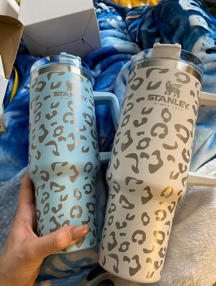 40oz Stan-ley Leopard print Reusable Tumbler with Handle and Straw Stainless Steel Insulated Travel Mug Insulated Keep Drinks Cold NEW trend GJ0510A
40oz Stan-ley Leopard print Reusable Tumbler with Handle and Straw Stainless Steel Insulated Travel Mug Insulated Keep Drinks Cold NEW trend GJ0510A