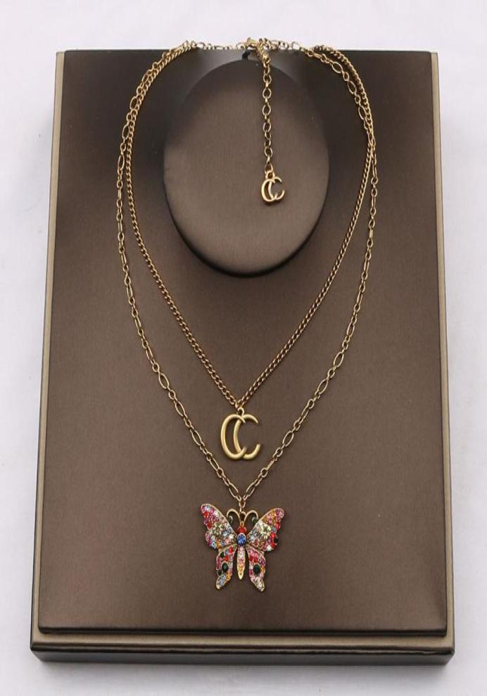 Luxury Designer Double Letter Pendant Necklaces 18K Gold Plated Butterfly Crysatl Pearl Rhinestone Sweater Necklace for Women Wedd8392404
Luxury Designer Double Letter Pendant Necklaces 18K Gold Plated Butterfly Crysatl Pearl Rhinestone Sweater Necklace for Women Wedd8392404