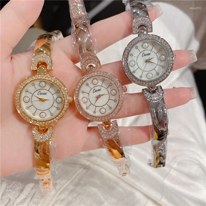 Wristwatches Cacaxi Watch For Women Rhinestone Luxury Elegant Wrist Bracelet Jewelry Gifts Lady Quartz Pearl Watches A150, Gold
Wristwatches Cacaxi Watch For Women Rhinestone Luxury Elegant Wrist Bracelet Jewelry Gifts Lady Quartz Pearl Watches A150, Gold