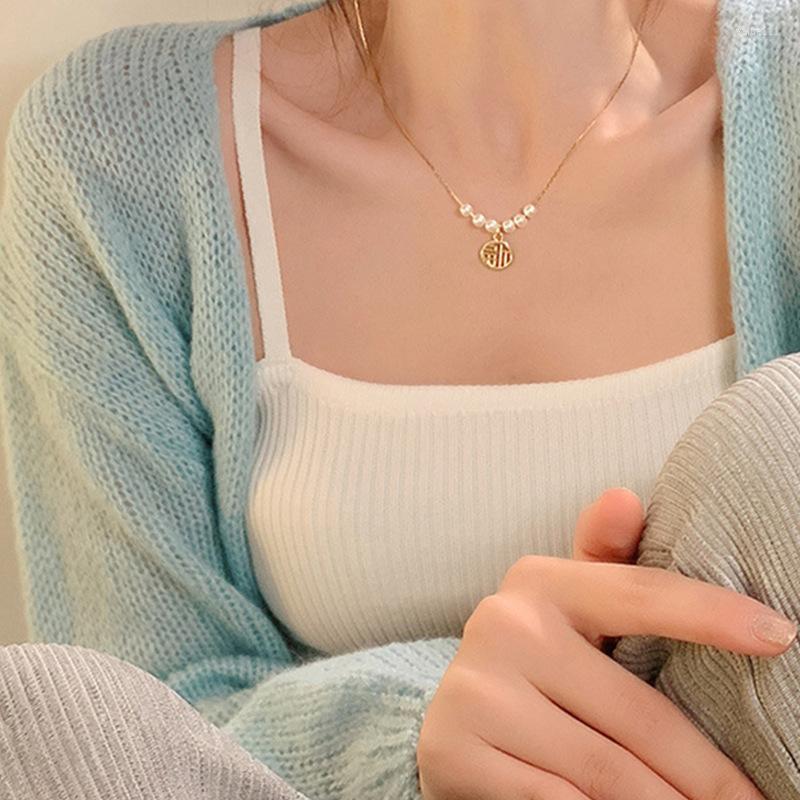 Pendant Necklaces Summer Pearl Small Blessing Character Personalized Classic Clavicle Chain Minimalist Versatile Neckchain For Women
Pendant Necklaces Summer Pearl Small Blessing Character Personalized Classic Clavicle Chain Minimalist Versatile Neckchain For Women