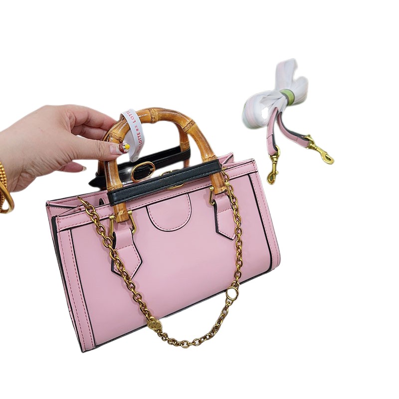 2023 Luxury Shopping Bag Designer Bags Diana Bamboo New Fashion Genuine Leather Bag Wallets Womens Tote Cross Body Shoppingbag Wallet Card Pockets Size 27 cm, Pink
2023 Luxury Shopping Bag Designer Bags Diana Bamboo New Fashion Genuine Leather Bag Wallets Womens Tote Cross Body Shoppingbag Wallet Card Pockets Size 27 cm, Pink