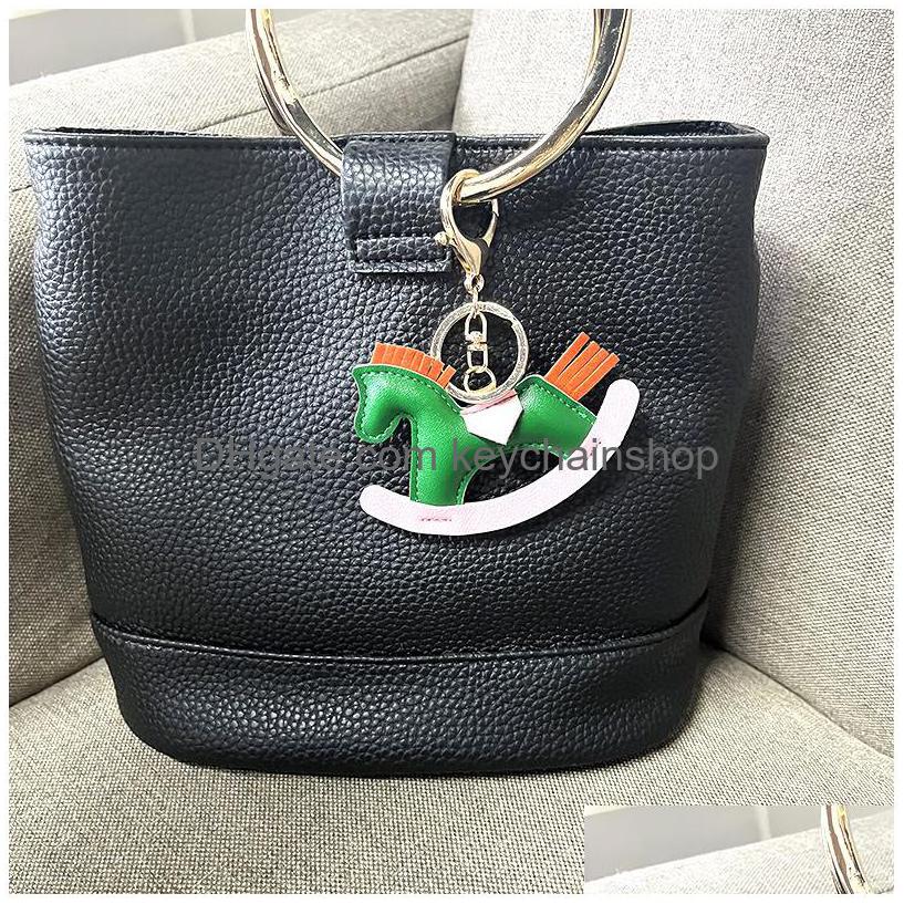 Key Rings Famous Trojan Horse Keychain Creative Party Leather Material Chain Childrens Fun Bag Pendant Lovely Keyring Drop Delivery J Dha75
Key Rings Famous Trojan Horse Keychain Creative Party Leather Material Chain Childrens Fun Bag Pendant Lovely Keyring Drop Delivery J Dha75