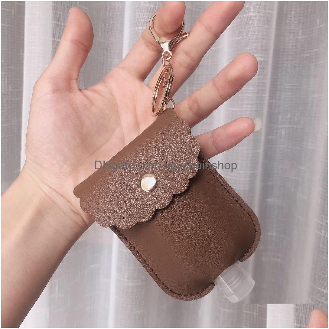 Key Rings 18 Colors Hand Sanitizer Holder With Empty Bottle Keychain Bags 30Ml Pu Leather Soap Per Er Drop Delivery Jewelry Dhuur
Key Rings 18 Colors Hand Sanitizer Holder With Empty Bottle Keychain Bags 30Ml Pu Leather Soap Per Er Drop Delivery Jewelry Dhuur