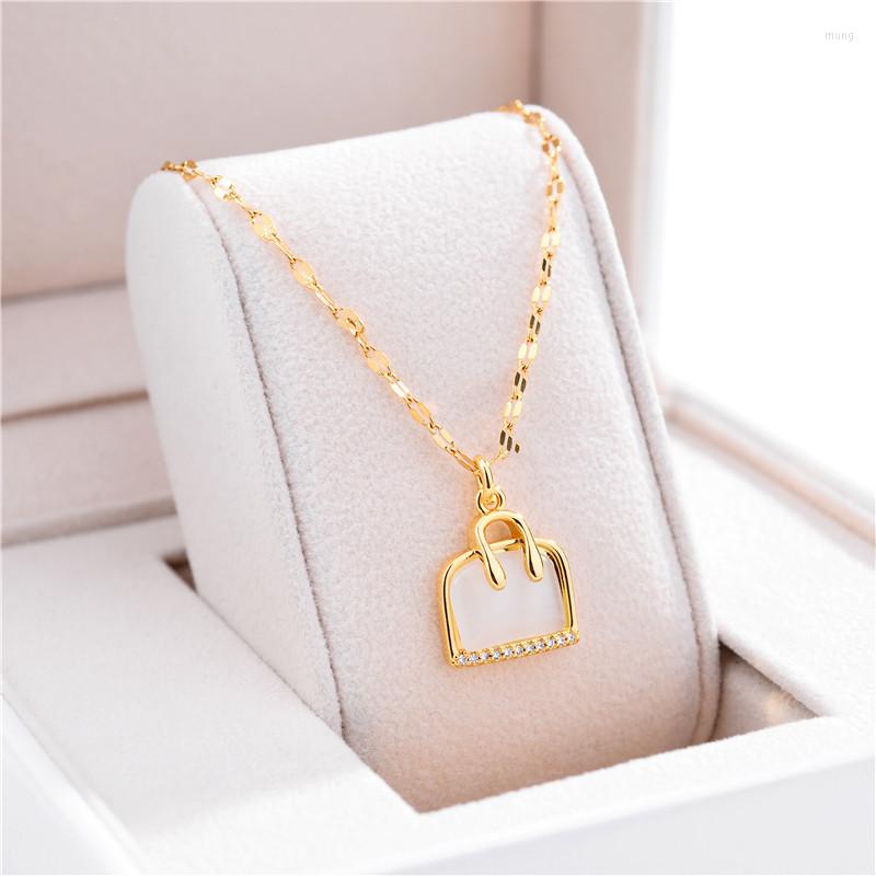 Pendant Necklaces Sweet Elegant Crystal Inlaid Opal Handbag Women Light Luxury Gold Color Stainless Steel Ladies Neck Jewelry
Pendant Necklaces Sweet Elegant Crystal Inlaid Opal Handbag Women Light Luxury Gold Color Stainless Steel Ladies Neck Jewelry