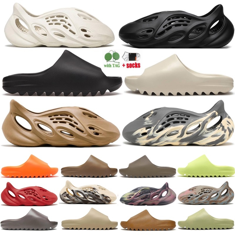 Slippers Slides Foam Sandals Sneakers Slider Shoes Trainers Runner Graffiti Bone White Resin Desert Sand Rubber Summer Designer Beach, Onyx
Slippers Slides Foam Sandals Sneakers Slider Shoes Trainers Runner Graffiti Bone White Resin Desert Sand Rubber Summer Designer Beach, Onyx