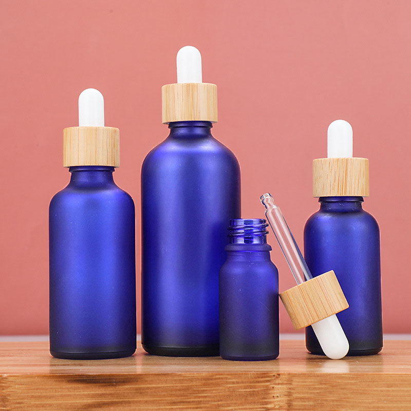 Frosted glass essential oil dropper bottles Blue amber green serum bottle with bamboo reagent pipette cap 10ml 20ml 30ml 50ml 100ml