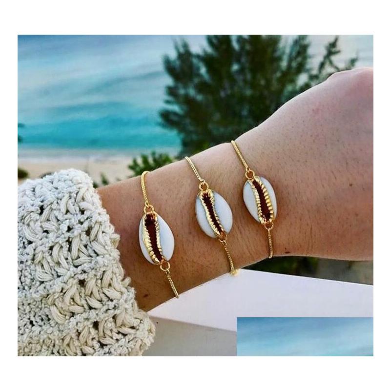 Charm Bracelets Bohemian Beach Shell Adjustable Bracelet For Women Gold Alloy Chain Boho Jewelry Accessories Gb867 Drop Delivery Dhvpa
Charm Bracelets Bohemian Beach Shell Adjustable Bracelet For Women Gold Alloy Chain Boho Jewelry Accessories Gb867 Drop Delivery Dhvpa