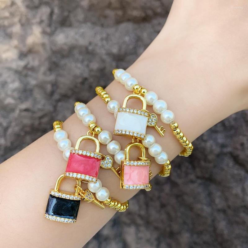 Charm Bracelets Gold Plated Beads Chain Padlock For Women Enamel Pink Lock Key Elastic CZ Jewelry Gifts Brtb01
Charm Bracelets Gold Plated Beads Chain Padlock For Women Enamel Pink Lock Key Elastic CZ Jewelry Gifts Brtb01