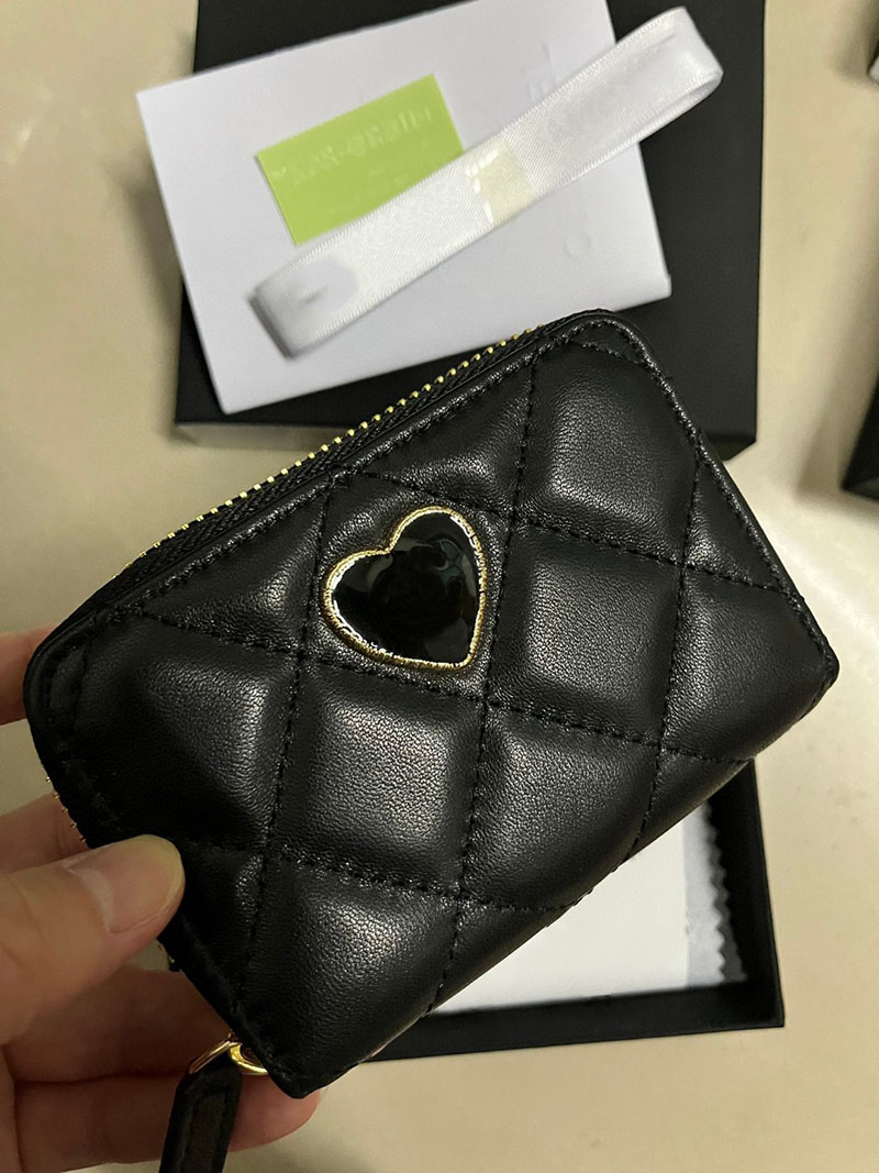 The new heart coin purses lady small genuine leather wallet famous designer card holder, Black
The new heart coin purses lady small genuine leather wallet famous designer card holder, Black