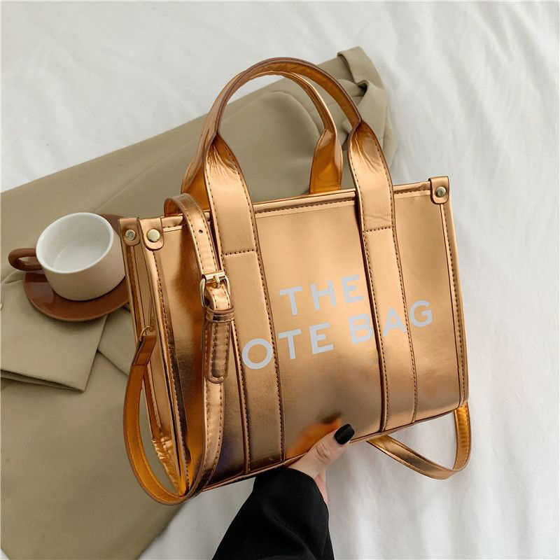 Luxury The Tote Bag Women HandbagAdvanced Shiny Face Tote Bags 2023 New Large Space New Handheld One Shoulder Crossbody Women's Large Beach Totes Bag
Luxury The Tote Bag Women HandbagAdvanced Shiny Face Tote Bags 2023 New Large Space New Handheld One Shoulder Crossbody Women's Large Beach Totes Bag