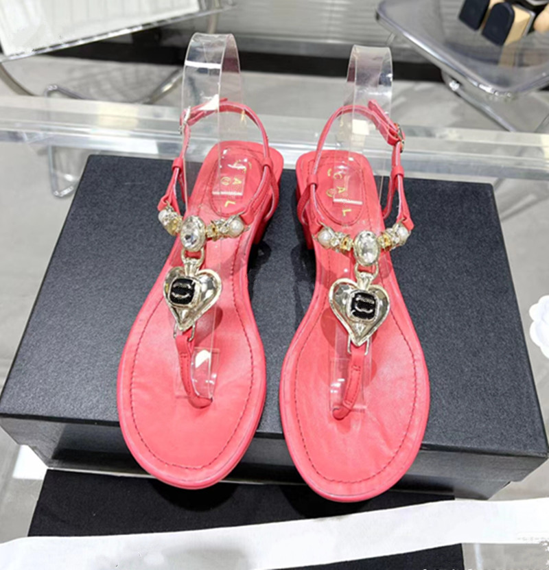 New Paris Brand Designer women's Sandals Summer Fashion Versatile 2c Love Pearl Buckle Women flip-flops Flat Sandals women's Slipper Channel T Lace up Female Beach Shoe, Logo c h a n e l high quality
New Paris Brand Designer women's Sandals Summer Fashion Versatile 2c Love Pearl Buckle Women flip-flops Flat Sandals women's Slipper Channel T Lace up Female Beach Shoe, Logo c h a n e l high quality