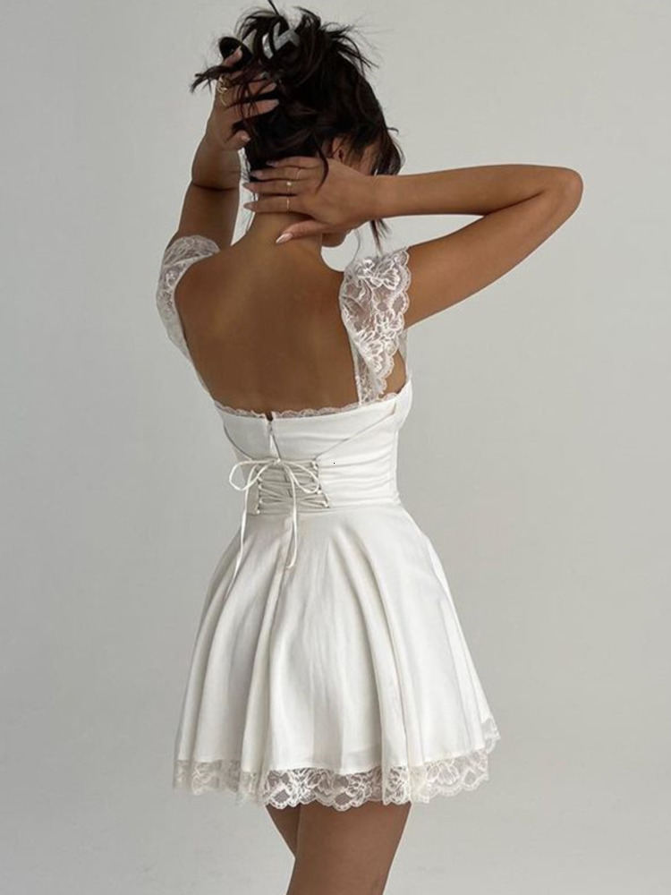 Urban Sexy Dresses Gaun Mini Tali Renda Putih Elegan Mozisi untuk Wanita Pendek Seksi Longgar Tanpa Lengan Mode Pakaian Klub Vestido 230517