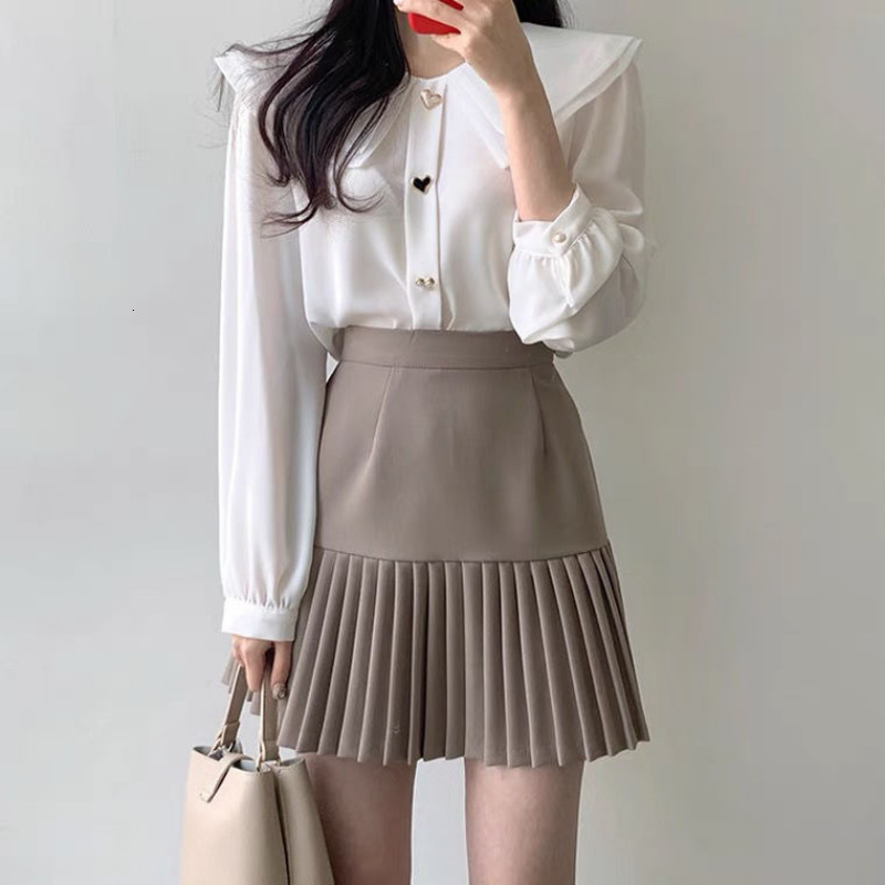 Skirts Pleated Mini Skirts Women Spring Vintage Solid Temperament Korean Preppy Style Fashion All-match Office Lady High Waist 230518