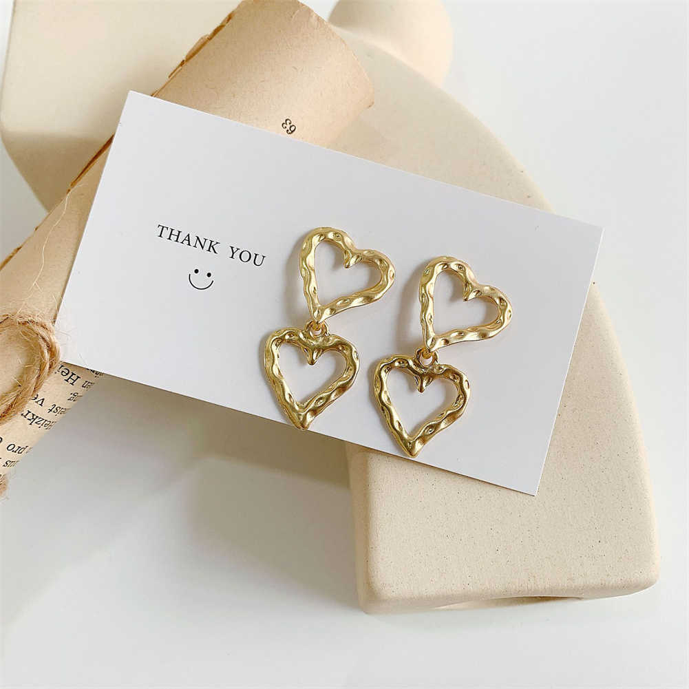 Charm Temperament Gold Color Fashion Hollow Out Heart Shape Stud Earrings For Women Student Girlfriend Jewelry Vintage Metal Earrings AA230518